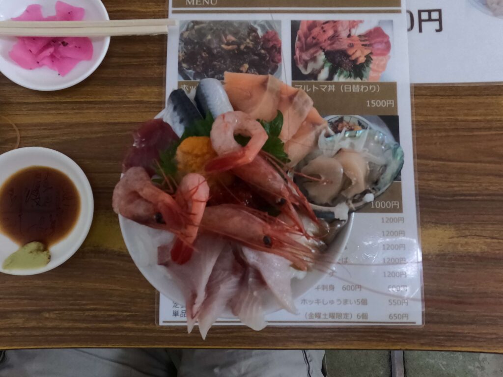 Seafood sashimi over rice