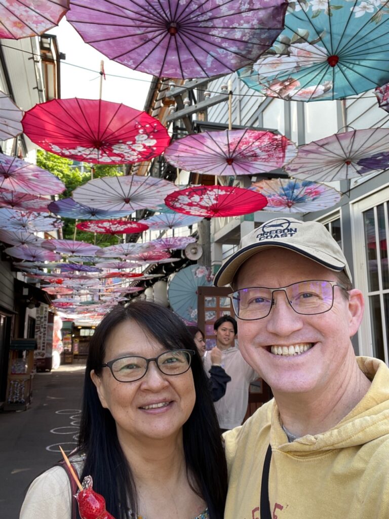 Couple with Japanese parasols in Hokkaido Japan