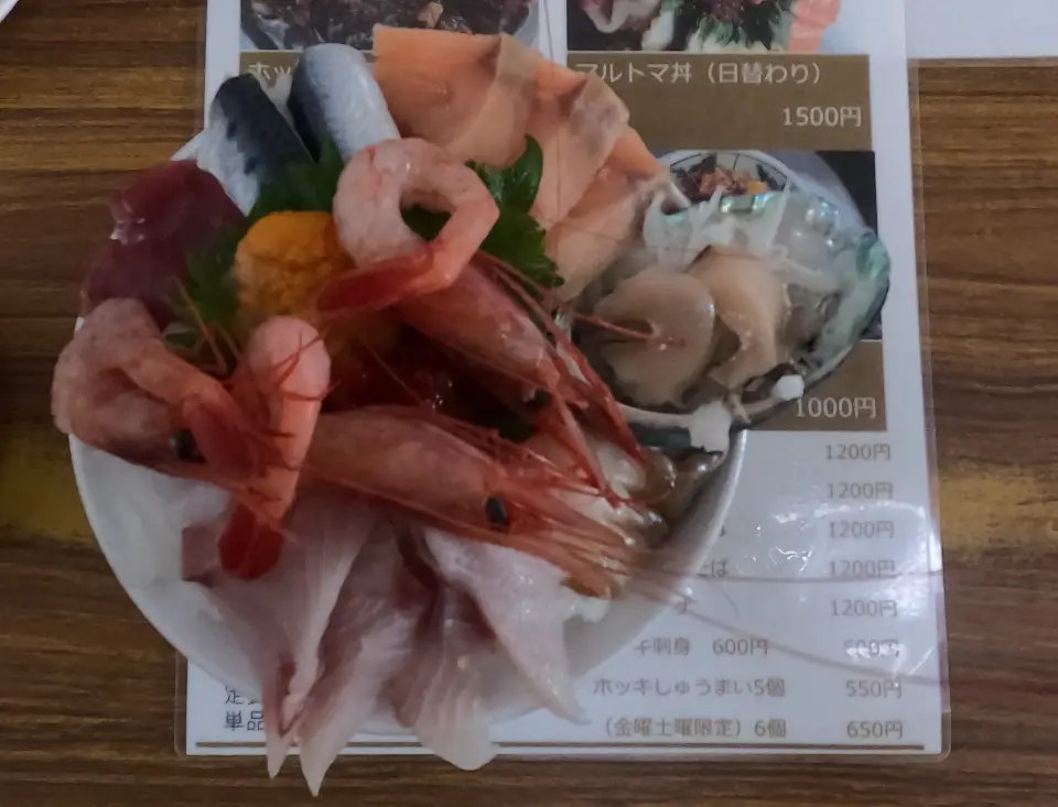 bowl of fresh seafood on rice